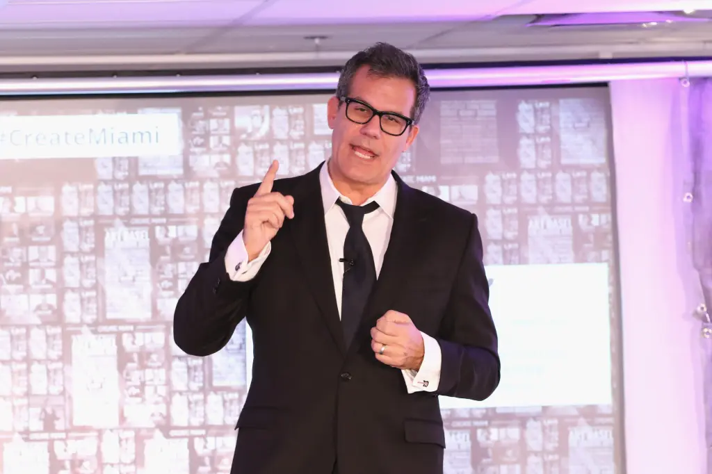 Richard Florida gestures while speaking at a conference